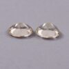 Loose Unheated Yellow Aquamarine Held in Tweezers for Custom Ring