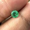 Natural Emerald 0.25 Carat | 4.3mm Round Cut Strong Vivid Green Gemstone Angled View of Faceted 4.3mm Round Cut Natural Emerald
