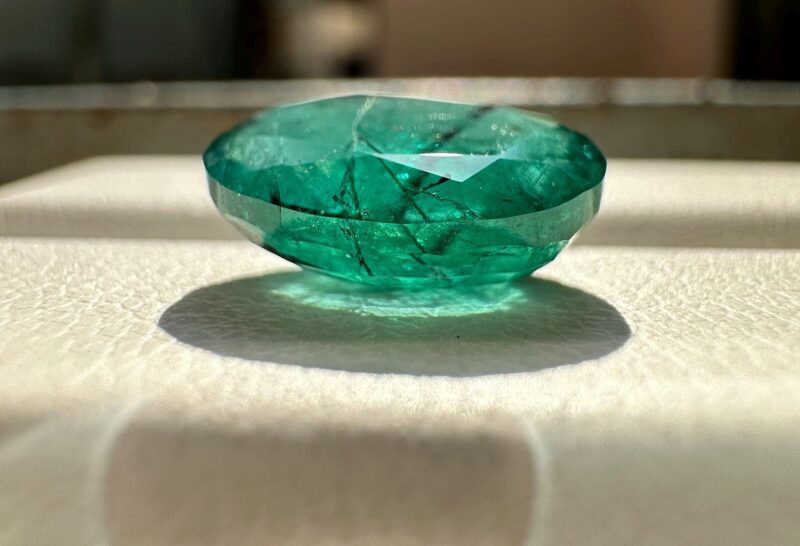 Macro Detail of Unique Black Underline Inclusion in Emerald