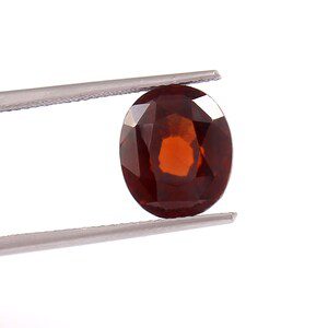 11.5mm Hessonite Garnet Gomed Size Reference on Hand