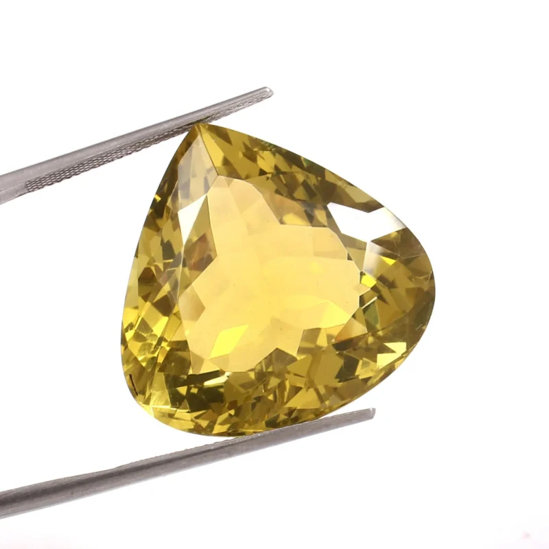 Faceted Yellow Quartz Heart Shape Gemstone Sparkling Angle View