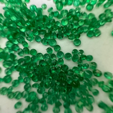 Macro Detail of Diamond Cut Facets on 2mm Round Emerald