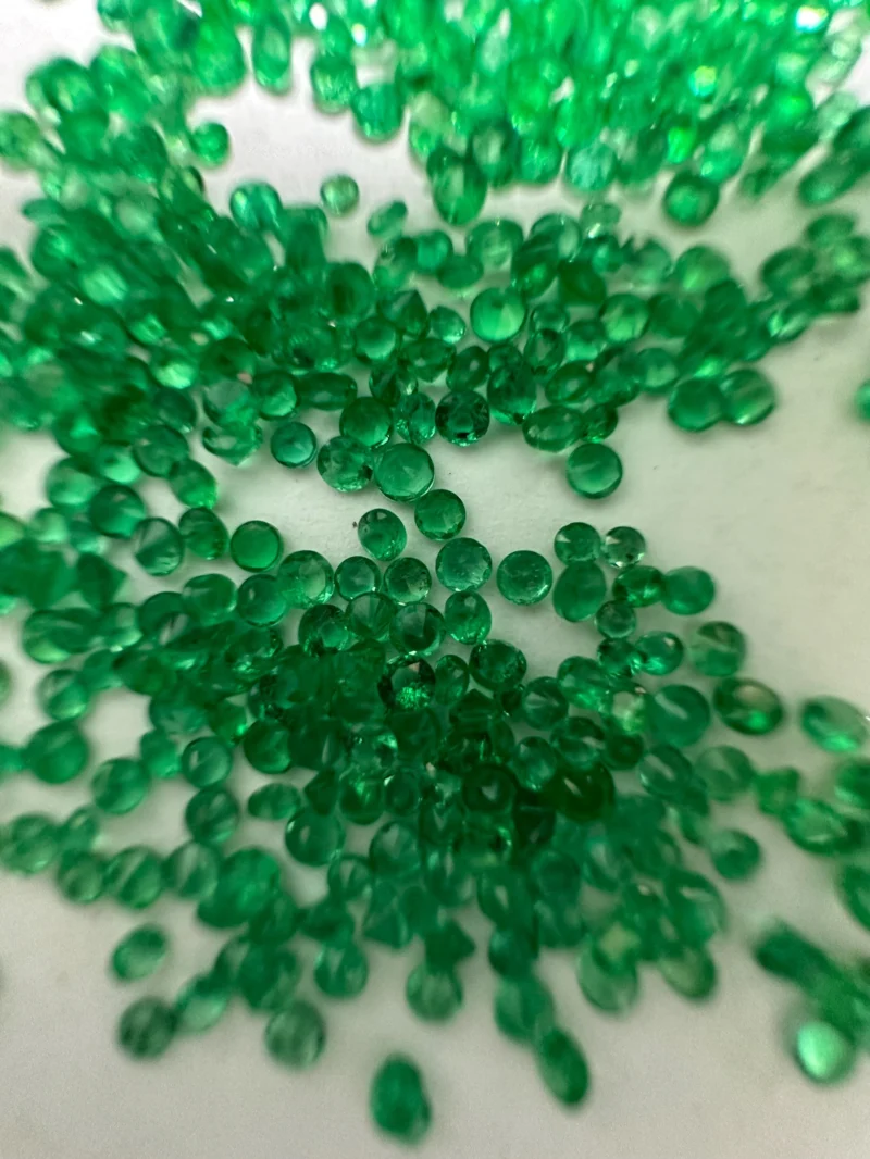Macro Detail of Diamond Cut Facets on 2mm Round Emerald