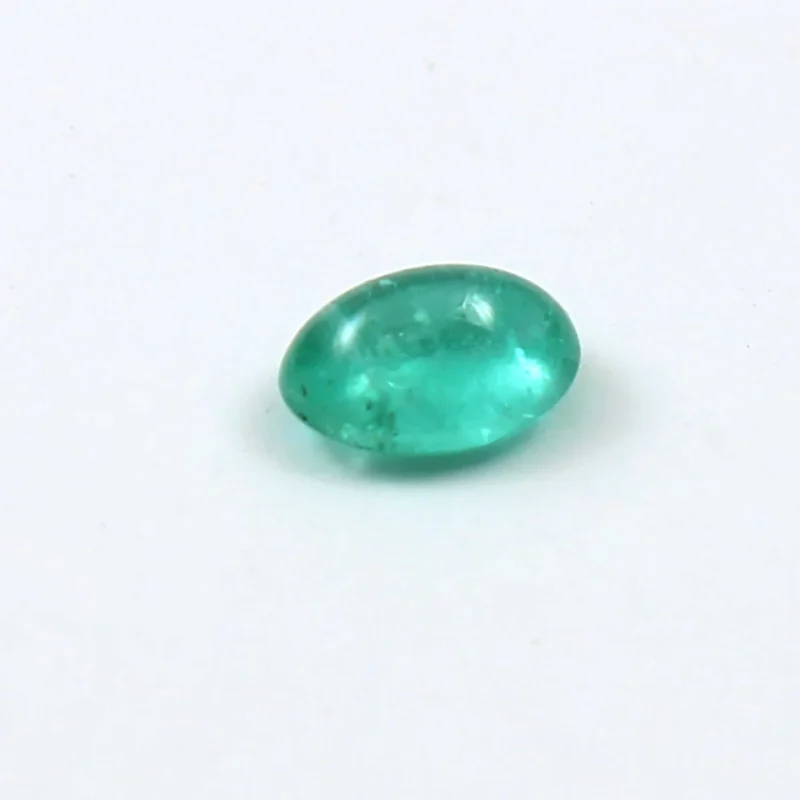 Side Profile View of Oval Emerald Cabochon Dome Height