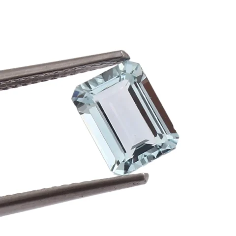 Loose Eye Clean Aquamarine Held in Tweezers for Custom Jewelry