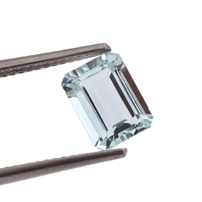 Loose Eye Clean Aquamarine Held in Tweezers for Custom Jewelry