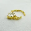 14k Gold Moissanite Nose Stud | Handmade Dainty Minimalist Pin Artisan Holding 14k Gold Moissanite Nose Stud with Tweezers