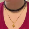 18k Gold Mangalsutra Necklace | Modern Moissanite & Filigree Beads Close up of 18k Gold Mangalsutra Necklace Worn on Neckline