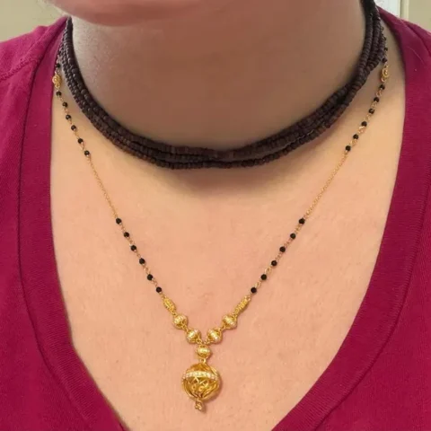 Close up of 18k Gold Mangalsutra Necklace Worn on Neckline
