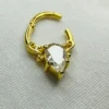 14k Gold Moissanite Nose Stud | Handmade Dainty Minimalist Pin Macro Detail of Moissanite Sparkle in 14k Gold Nose Stud