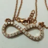 Infinity Moissanite Pendant Necklace | Rose Gold & Silver Minimalist infinity-moissanite-pendant-macro-sparkle-detail