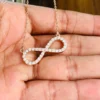 Infinity Moissanite Pendant Necklace | Rose Gold & Silver Minimalist Infinity Moissanite Pendant Necklace Worn on Neck Size Reference